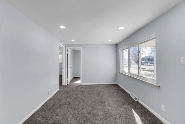 view of carpeted spare room