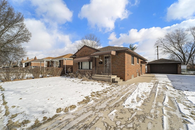 view of front of property with an outbuilding and a garage