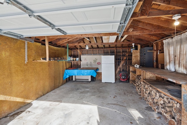 garage featuring white refrigerator