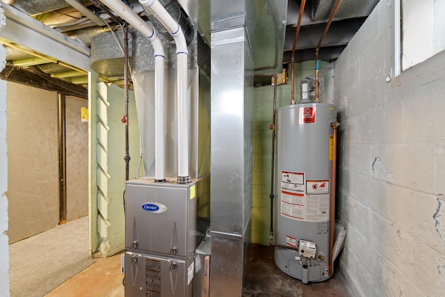 626 Orange St, Jackson, MI 49202 - utility room featuring gas water heater