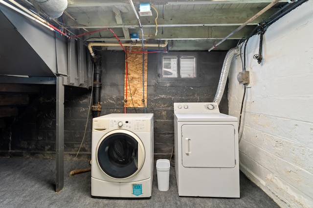 626 Orange St, Jackson, MI 49202 - washroom with washing machine and clothes dryer and concrete block wall