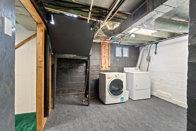 626 Orange St, Jackson, MI 49202 - basement with washing machine and clothes dryer and carpet flooring