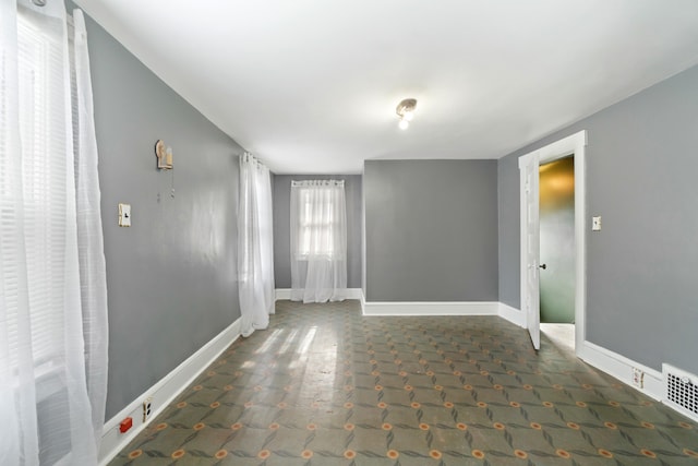 626 Orange St, Jackson, MI 49202 - spare room with baseboards