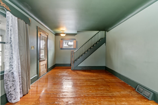 626 Orange St, Jackson, MI 49202 - entrance foyer featuring hardwood / wood-style floors and stairs