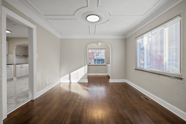 unfurnished dining area featuring crown molding and dark hardwood / wood-style flooring