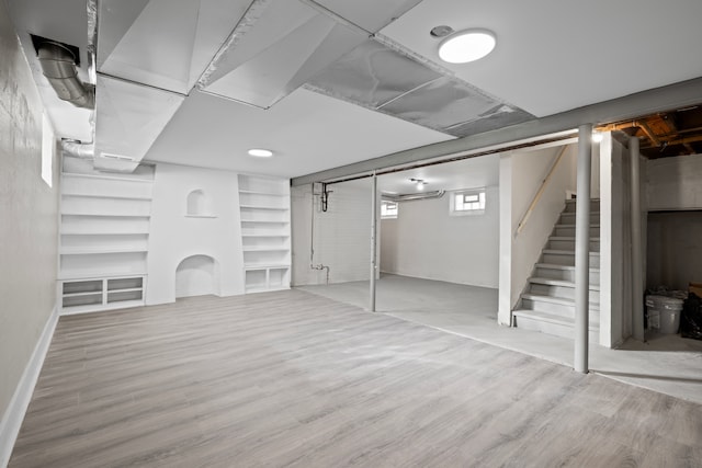 basement with light wood-type flooring