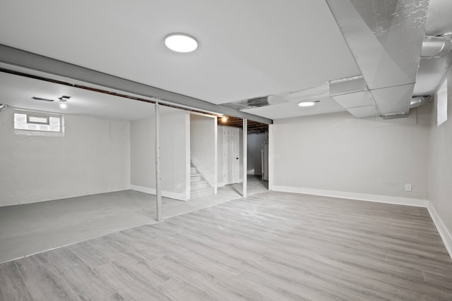 basement with light wood-type flooring