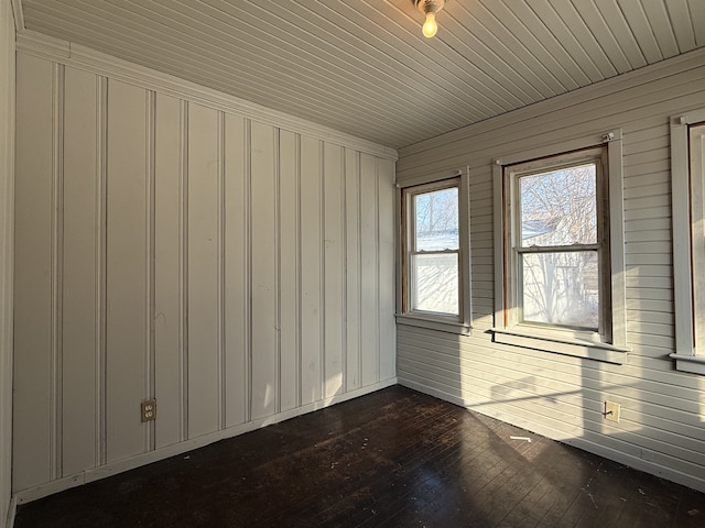 unfurnished sunroom featuring wooden ceiling