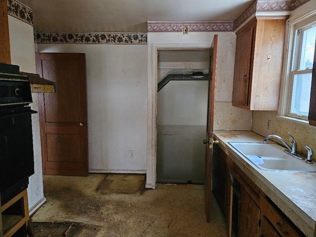 kitchen featuring sink and a healthy amount of sunlight