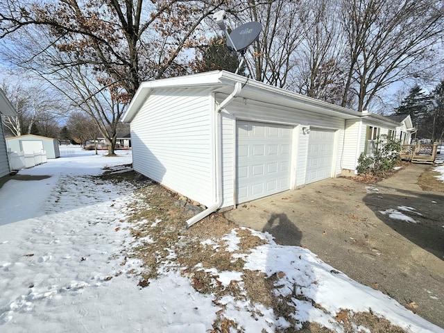 view of snow covered garage