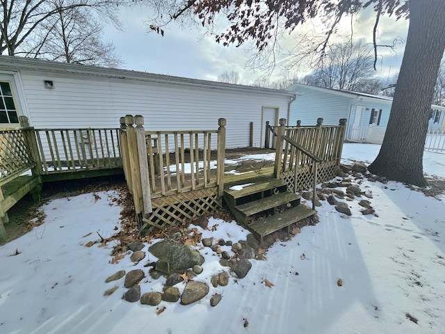 view of snow covered deck