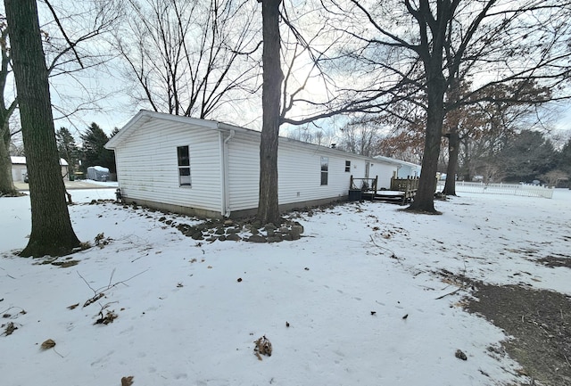 view of snow covered property