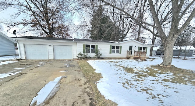 single story home featuring a garage