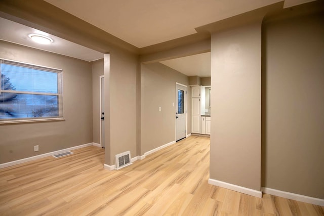 hall featuring light wood-type flooring