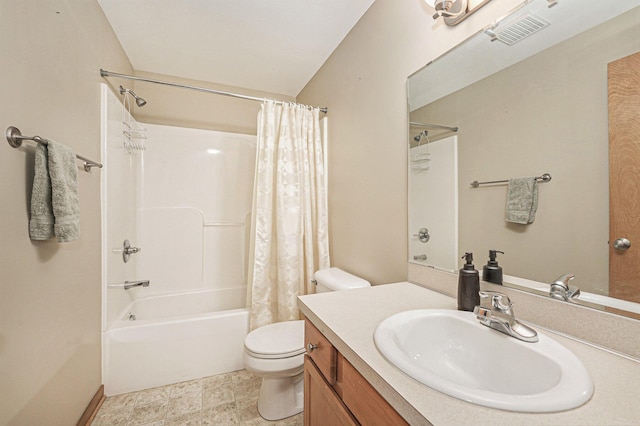 full bathroom featuring vanity, shower / bathtub combination with curtain, and toilet