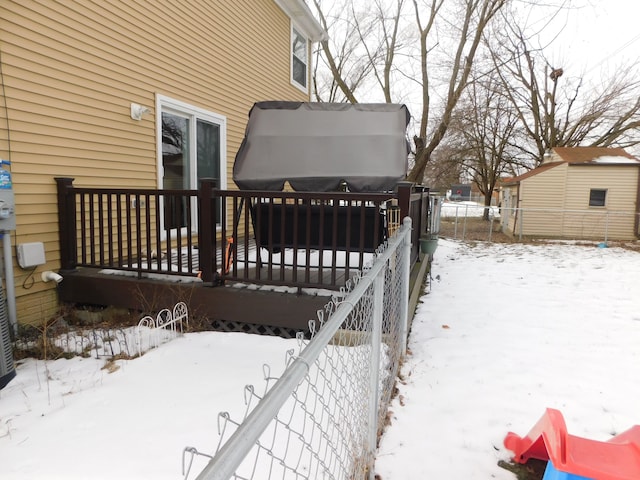 view of snow covered deck