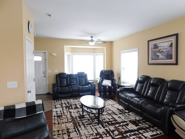 living room featuring ceiling fan