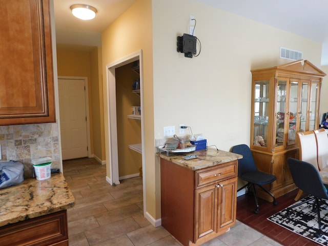 office area with light hardwood / wood-style flooring