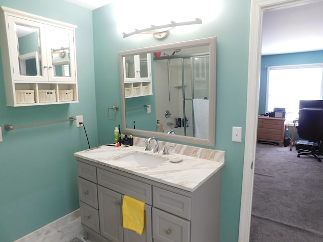 bathroom featuring vanity and walk in shower