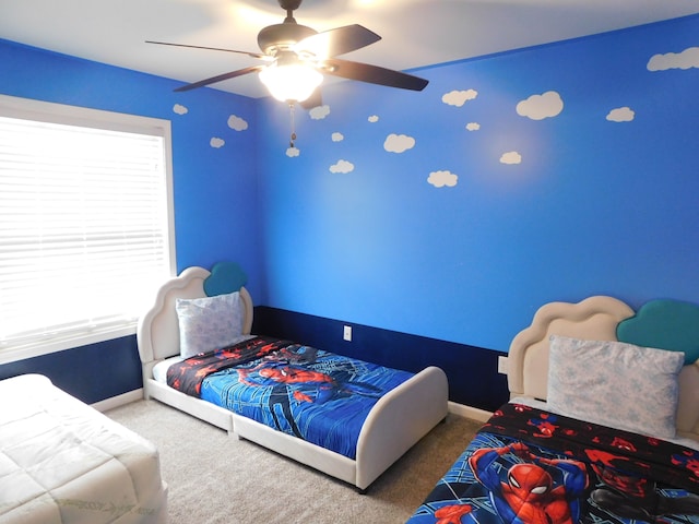 bedroom with ceiling fan and carpet