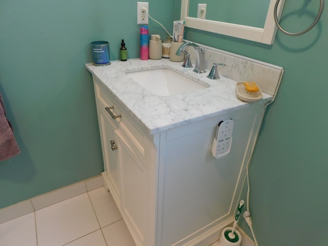 bathroom with tile patterned flooring and vanity