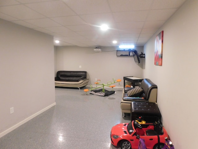 game room featuring a drop ceiling