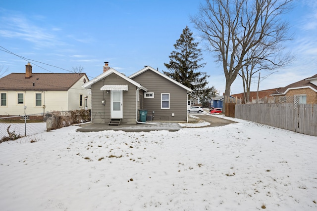 view of snow covered property