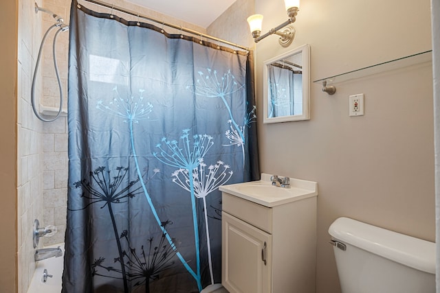 full bathroom with vanity, shower / tub combo with curtain, and toilet