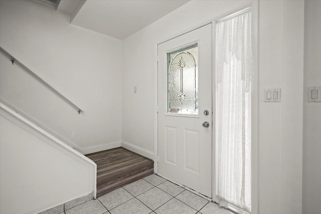 view of tiled foyer entrance