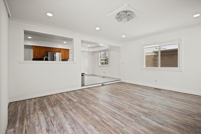 unfurnished room featuring light hardwood / wood-style flooring