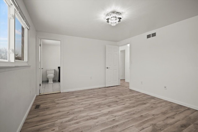 empty room featuring light wood-type flooring