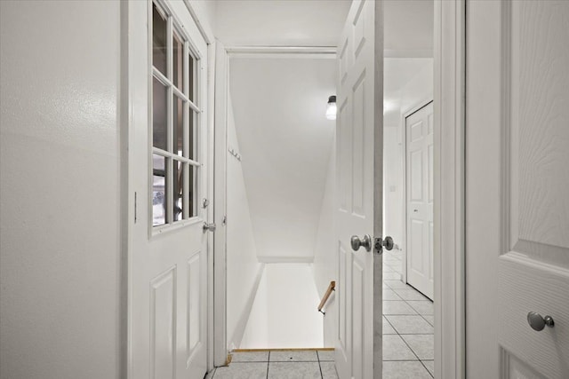 hallway with light tile patterned flooring