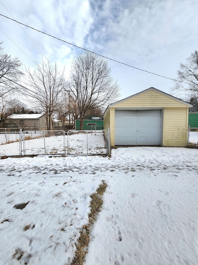 view of snow covered garage