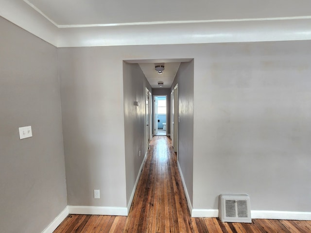 corridor featuring wood-type flooring