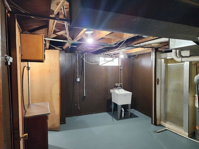 below grade area featuring a sink