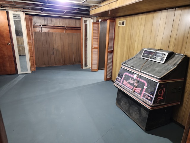 unfinished below grade area with wood walls