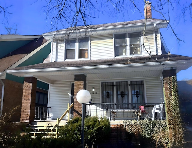 view of front of home featuring covered porch