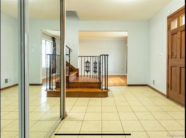 view of tiled foyer entrance