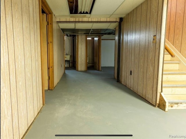 basement with wooden walls