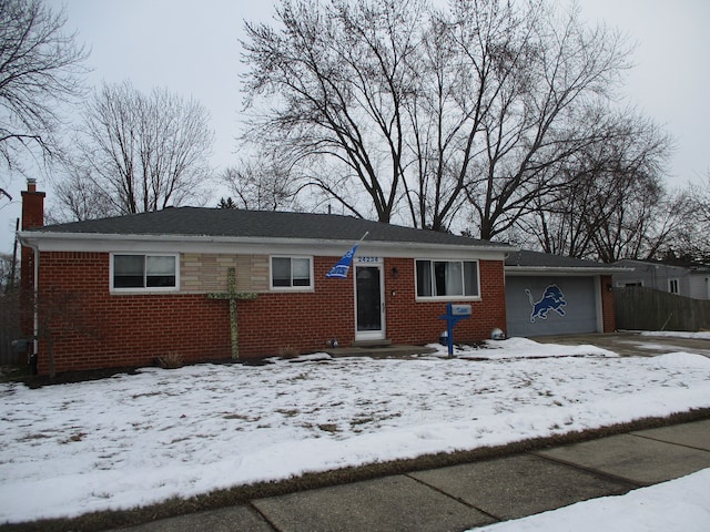 single story home featuring a garage