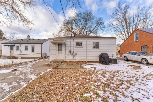 view of snow covered house