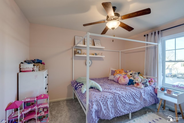 bedroom with ceiling fan and carpet