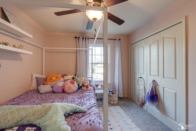 bedroom featuring ceiling fan, carpet floors, and a closet