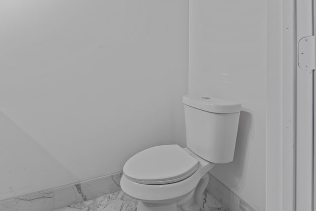 bathroom featuring toilet