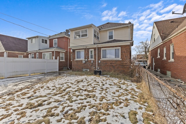 view of snow covered property