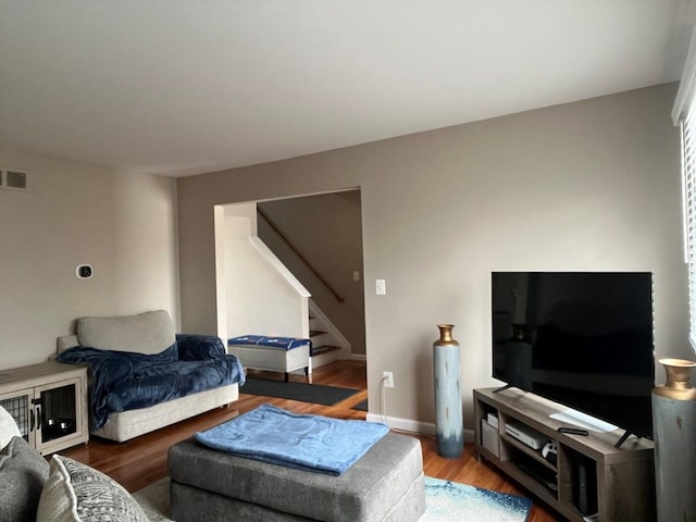 living room featuring wood-type flooring