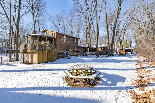 view of yard covered in snow