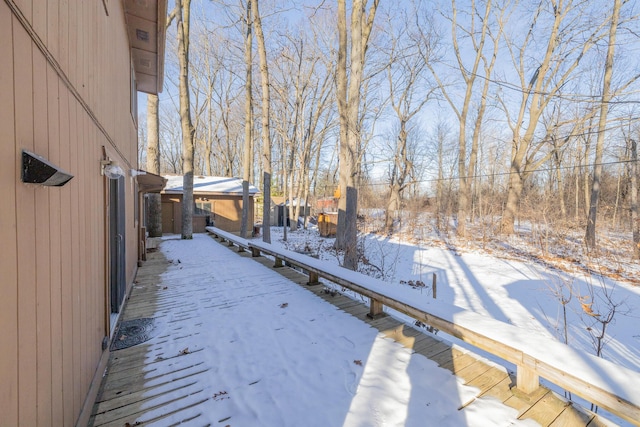 view of snow covered deck