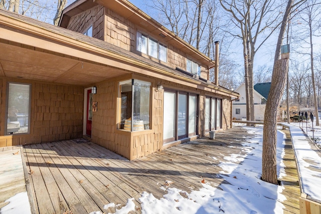 view of snow covered deck