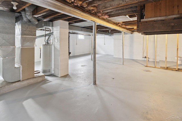 basement with water heater and heating unit